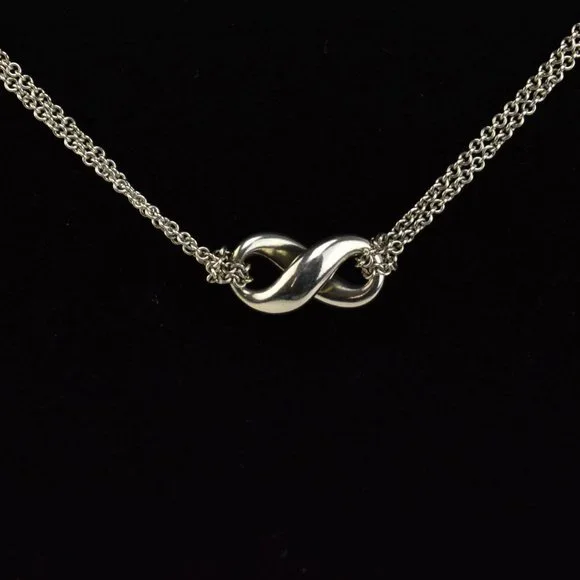TIFFANY & CO: Sterling Silver "Infinity" Necklace - Picture 3 of 6